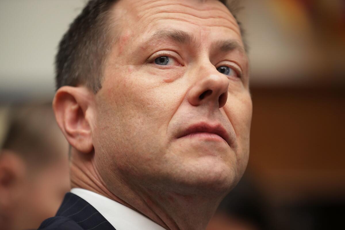 The FBI fired former Deputy Assistant Director Peter Strzok, shown at a congressional hearing in July, on Friday.