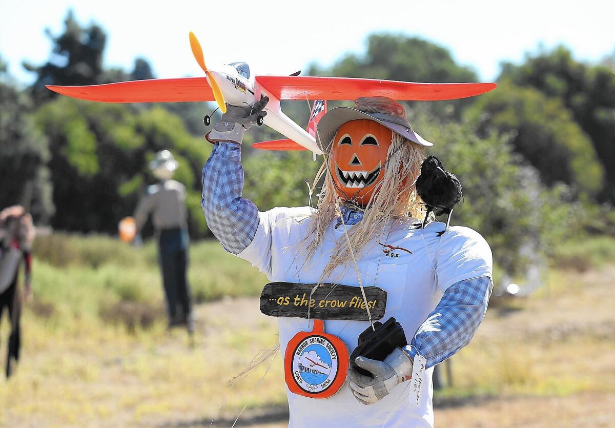 The "As the Crow Flies" scarecrow from Harbor Soaring Society, won the people's most popular choice in the 2014 Scarecrow Pumpkin Festival in Costa Mesa.