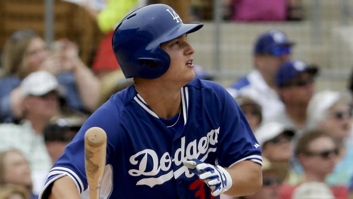 Dodgers outfielder Joc Pederson hits during an exhibition game against the Chicago Cubs on March 18.