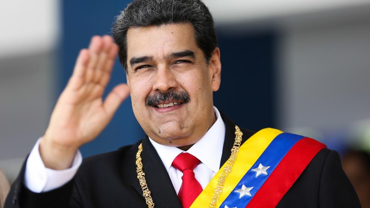 Handout photo released by Miraflores presidential palace press office shows Venezuela's President Nicolas Maduro during a military parade at the Los Proceres boulevard in the framework of the celebrations for the Independence Day in Caracas, Venezuela on July 5, 2019.