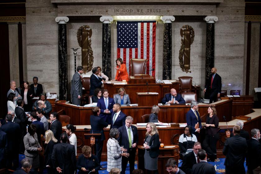 Mandatory Credit: Photo by SHAWN THEW/EPA-EFE/REX (10461982x) Speaker of the House Nancy Pelosi (C) presides over the House vote on a resolution formalizing the impeachment inquiry on the House floor in the US Capitol in Washington, DC, USA, 31 October 2019. The resolution passed 232-196. Resolution formalizing President Trump impeachment inquiry passed, Washington, USA - 31 Oct 2019 ** Usable by LA, CT and MoD ONLY **