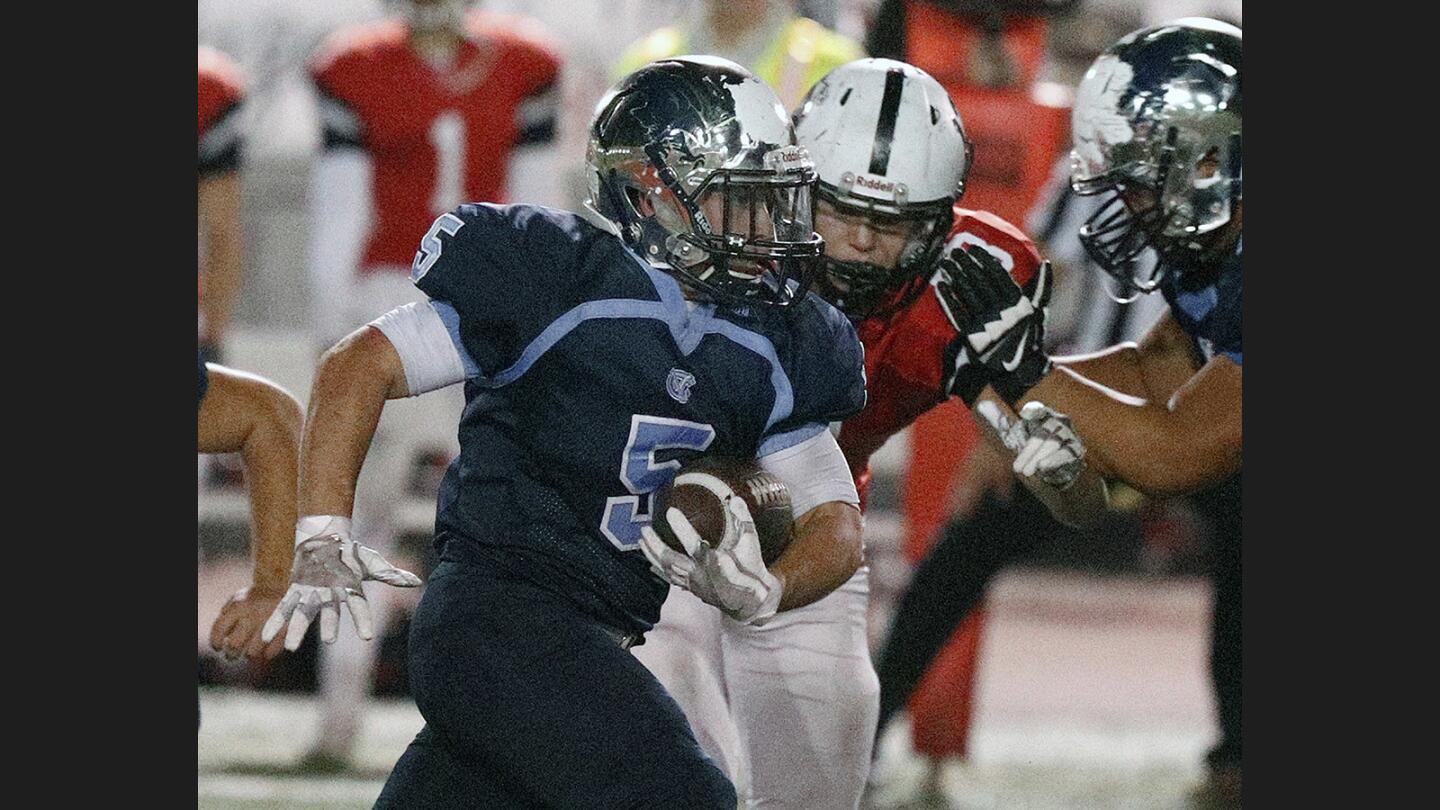 Photo Gallery: Crescenta Valley vs. Glendale in Pacific League football and the Crescenta Valley marching band takes the field in Halloween costumes