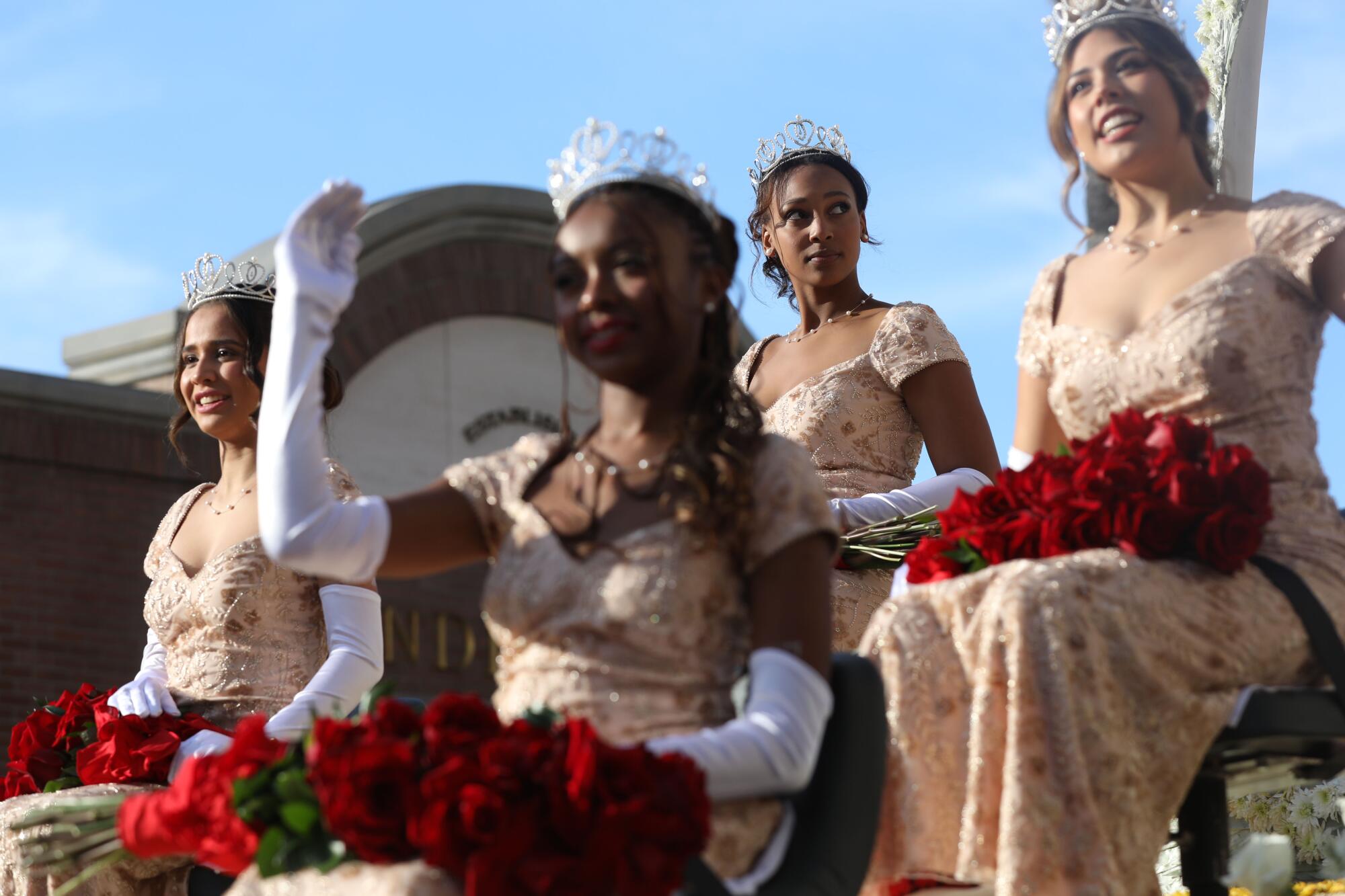 Pageant winners wave to the crowd during the Rose Parade on Monday, Jan. 1, 2024 in Pasadena, CA. 