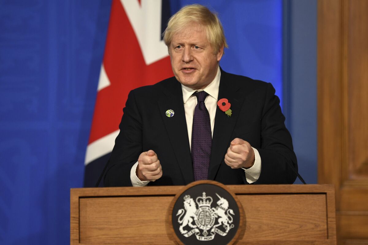 Britain's Prime Minister Boris Johnson during a press conference in Downing Street, London, Sunday, Nov. 14, 2021 about the Cop26 climate summit. (Daniel Leal/Pool photo via AP)