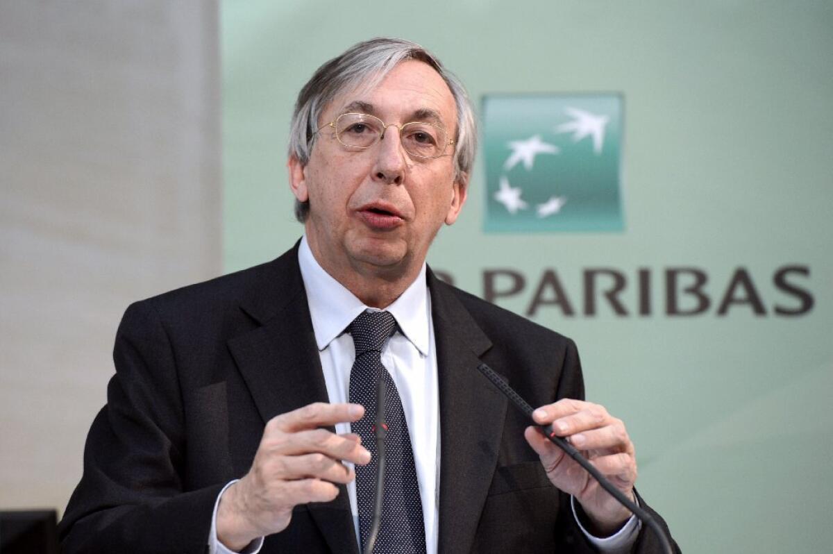 Georges Chodron de Courcel, above, chief operating officer of French banking giant BNP Paribas, has agreed to step down as part of the settlement announced Monday.