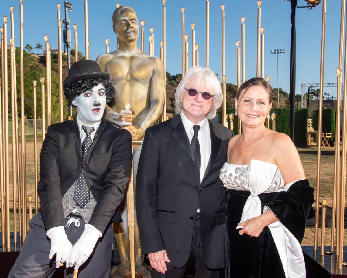 “Charlie Chaplin” with PSO Maestro Carl St. Clair and wife Susan.