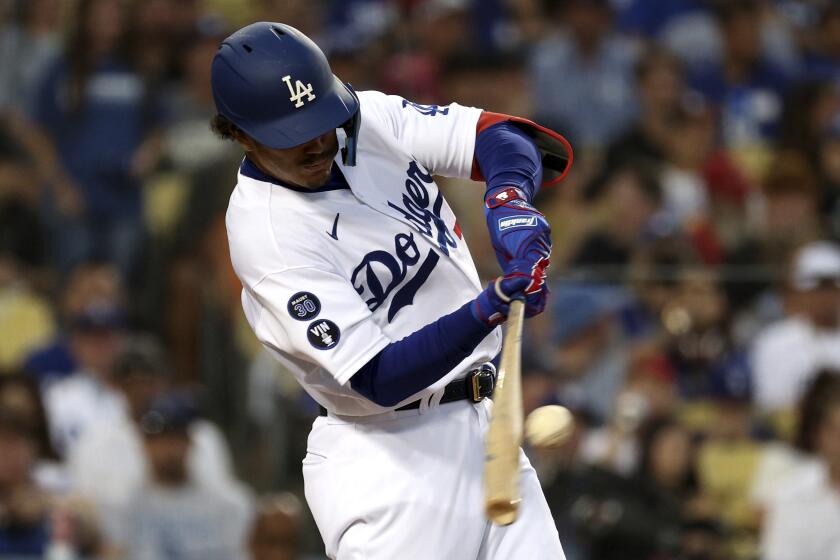 Los Angeles Dodgers first baseman Miguel Vargas hits a home run during the second inning.