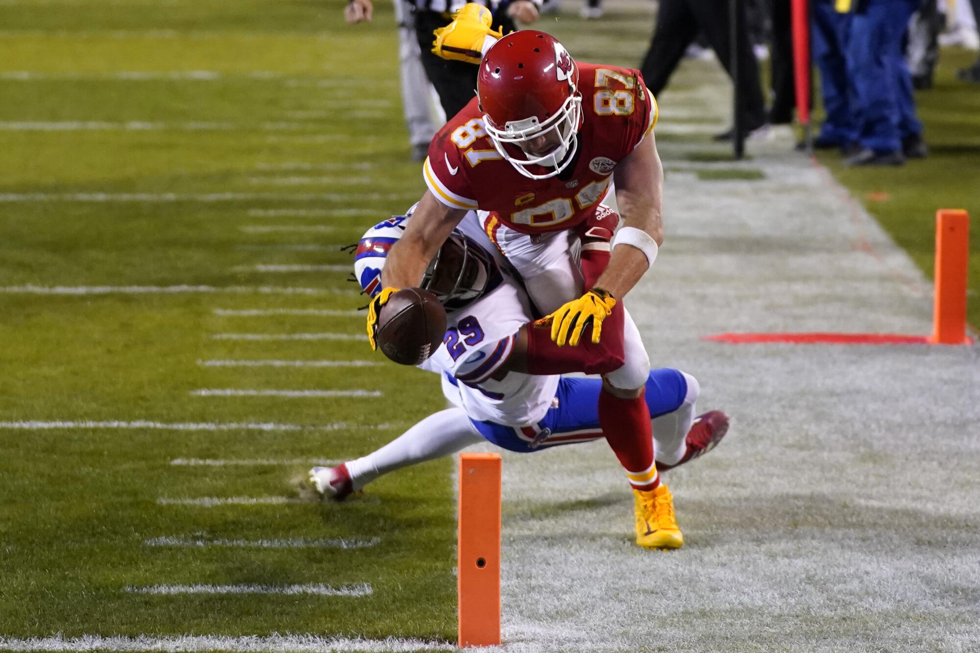 Kansas City Chiefs tight end Travis Kelce (87) dives toward the goal line over Buffalo Bills cornerback Josh Norman.