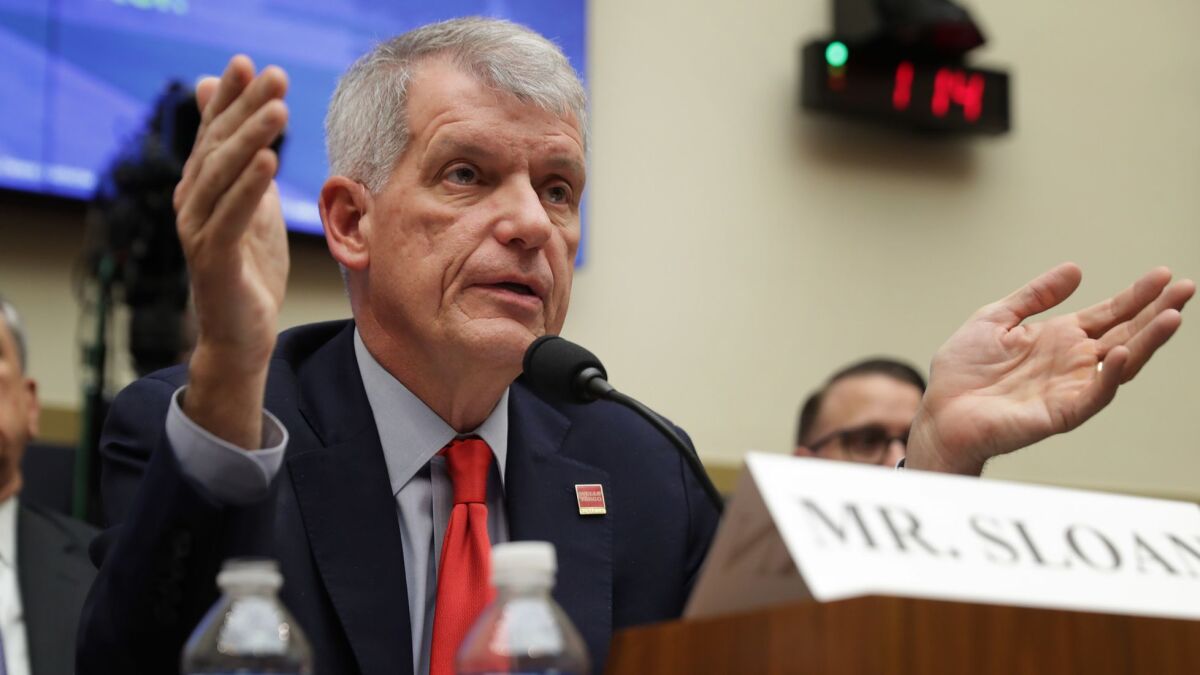 Wells Fargo CEO Tim Sloan testifies before lawmakers on the House Financial Services Committee on March 12.