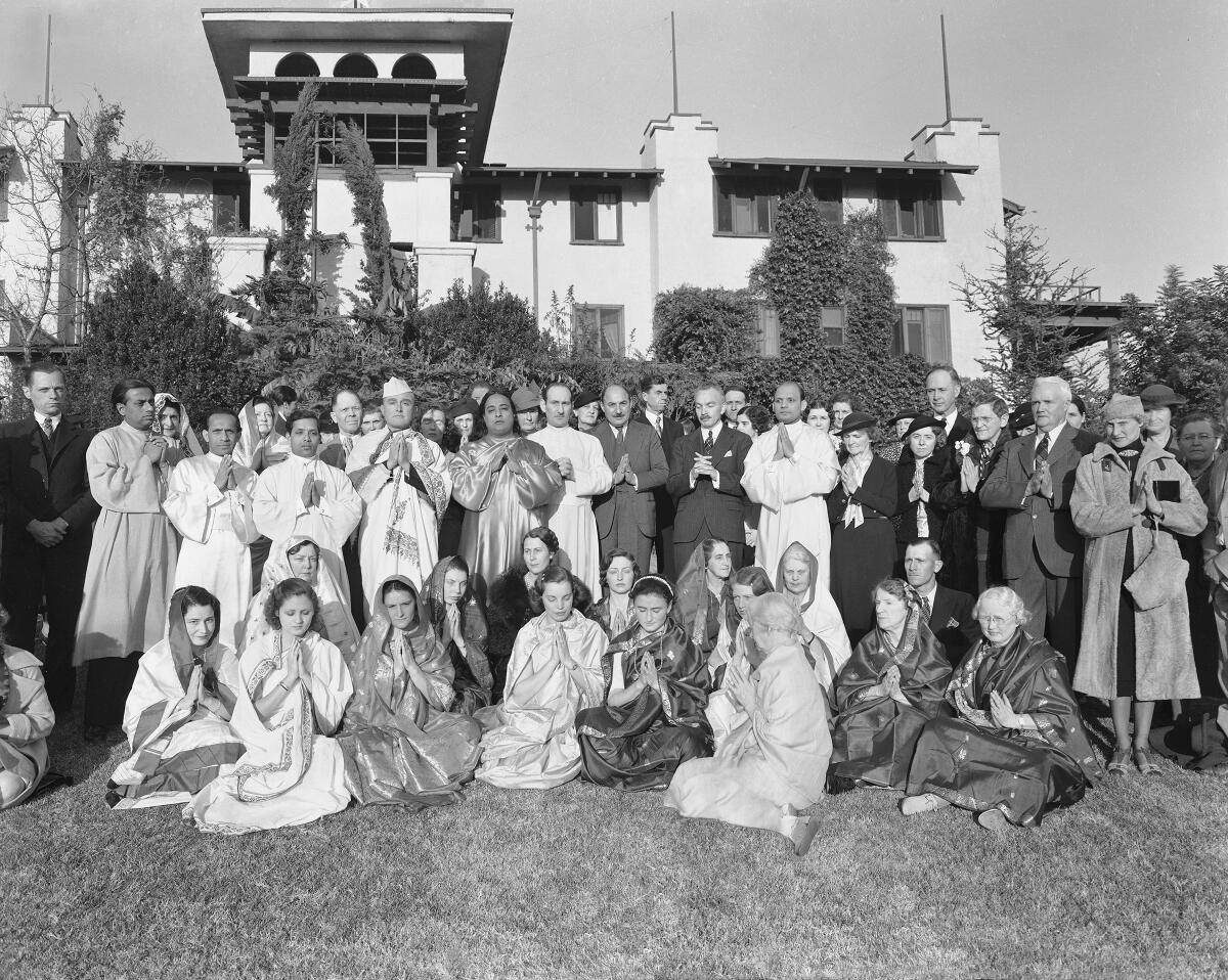 Paramahansa Yogananda with monastic disciples and students at the Self-Realization Fellowship in Los Angeles in 1937.