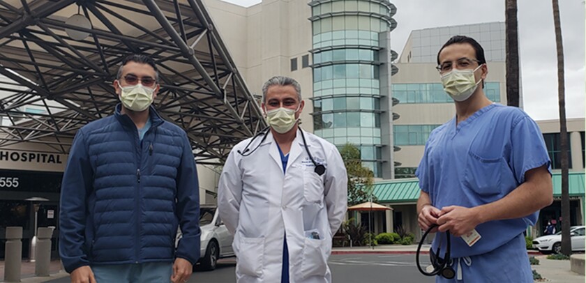 Dr. Raed Al-Naser, center, with colleagues at Grossmont Hospital. 