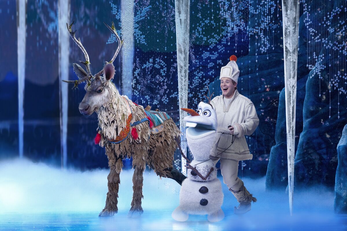 Collin Baja gamely dons the Sven suit, and F. Michael Haynie is a seamless double for Olaf in the "Frozen" musical's North American tour.