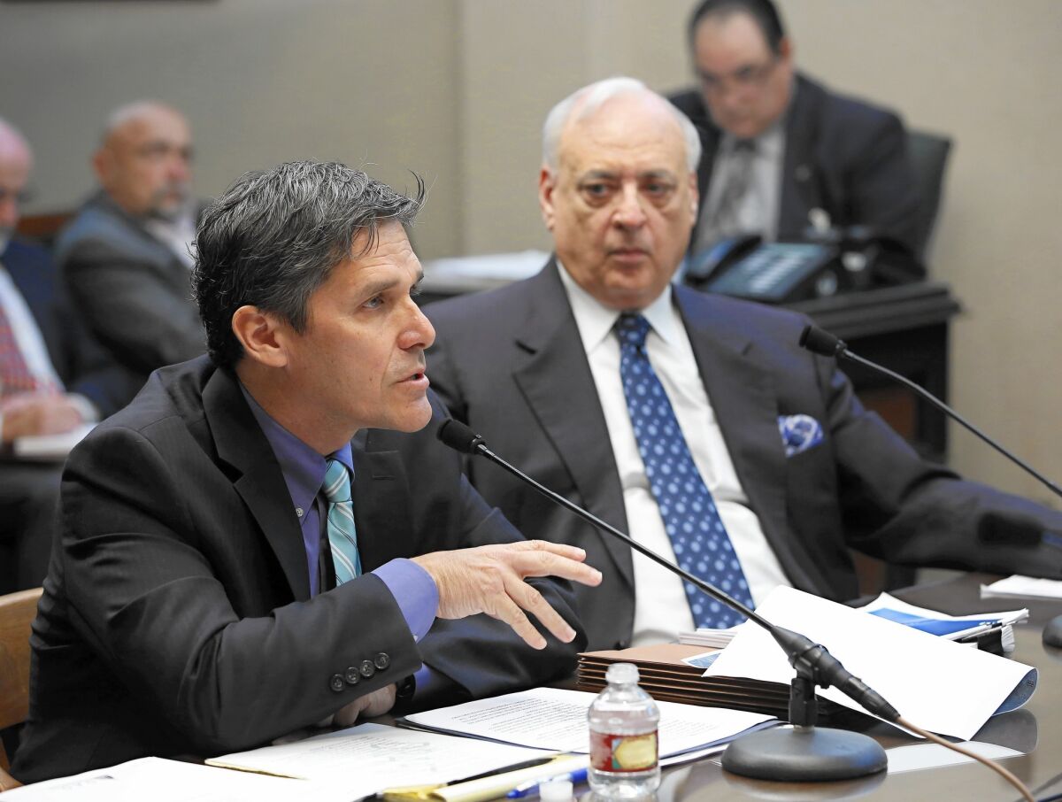 California High-Speed Rail Authority Chief Executive Jeff Morales, left, discusses the bullet train project at a legislative hearing. With him is Chairman Dan Richard.