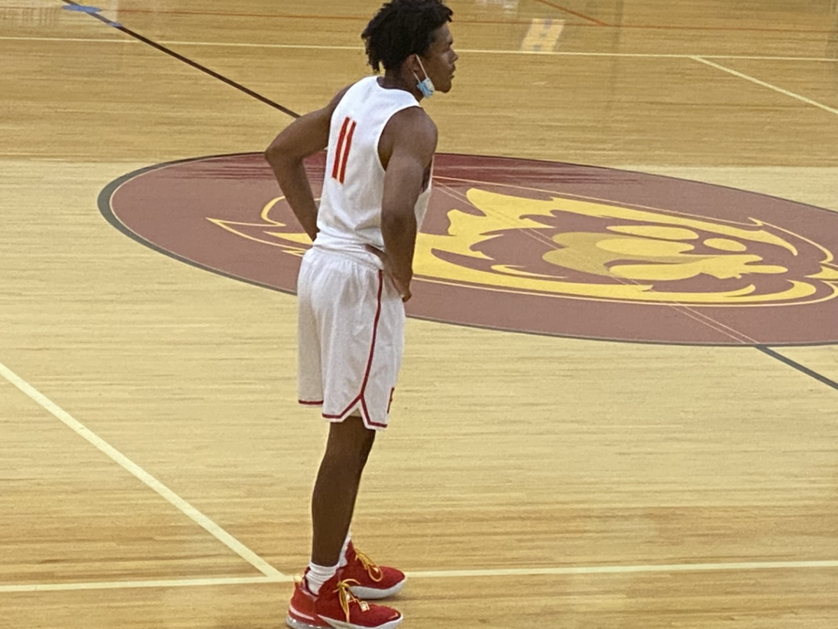 Fairfax's Barry Wilds looks on from the court during a game.