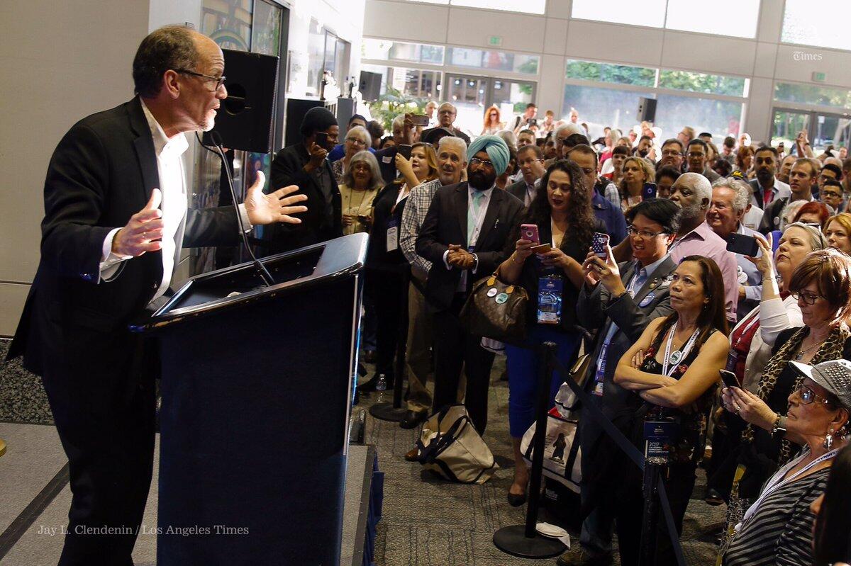 Democratic National Committee Chairman Tom Perez addresses a crowd.