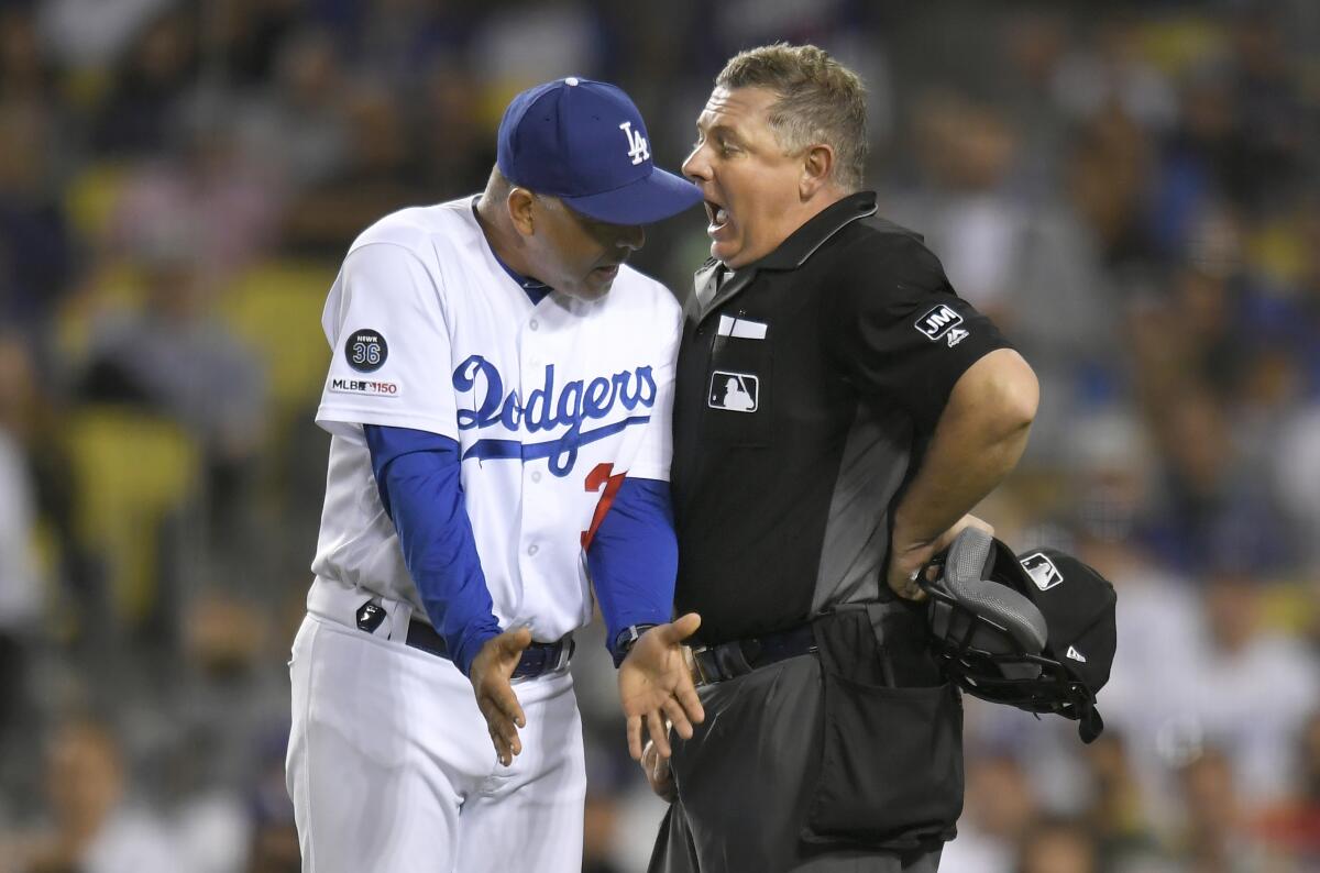 L.A. Dodgers manager Dave Roberts suspended 1 game for spat with Padres