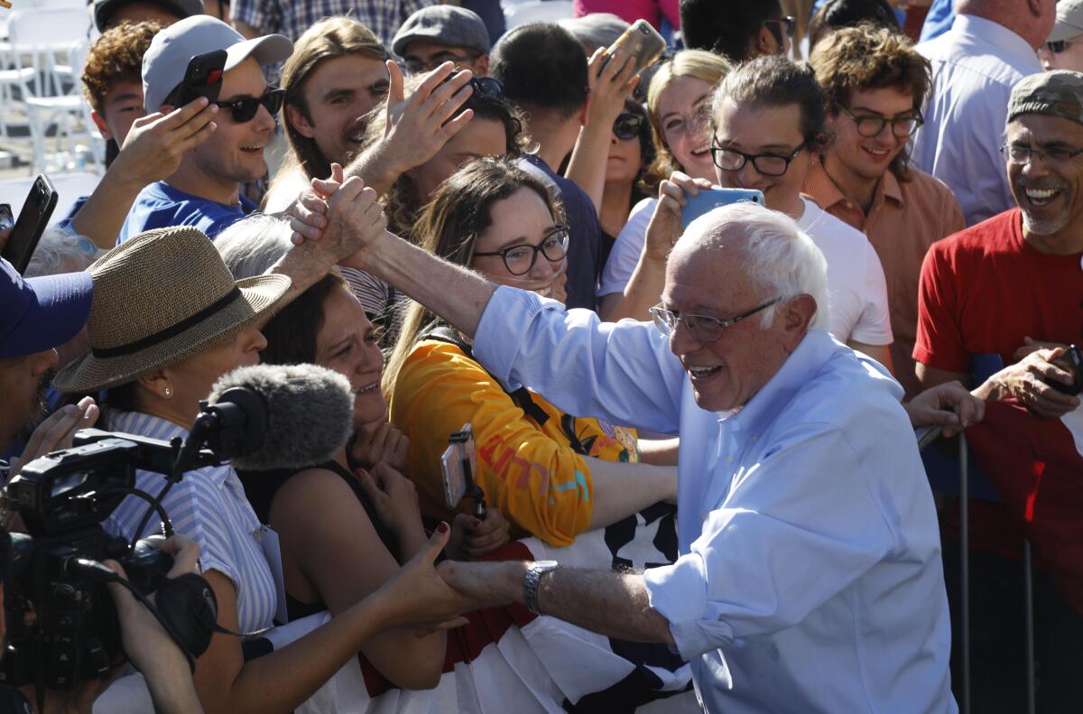 Bernie Sanders greets supporters at the end of his East L.A. rally.