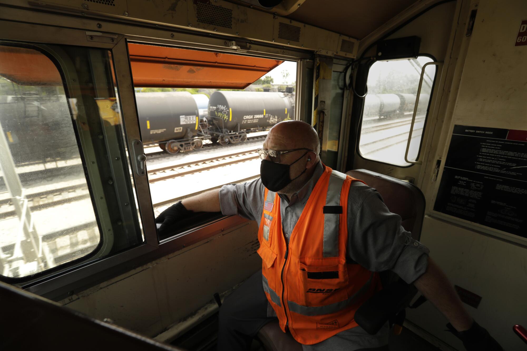 Russ Abbott, a locomotive engineer, drives the 3800 horsepower BNSF locomotive