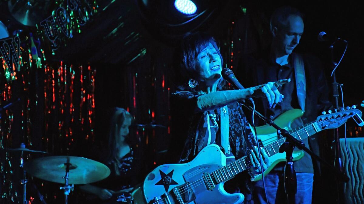 Rosie Flores leads the Rosie Flores Revue at C-Boy's, a music club on South Congress Avenue in Austin, Texas.