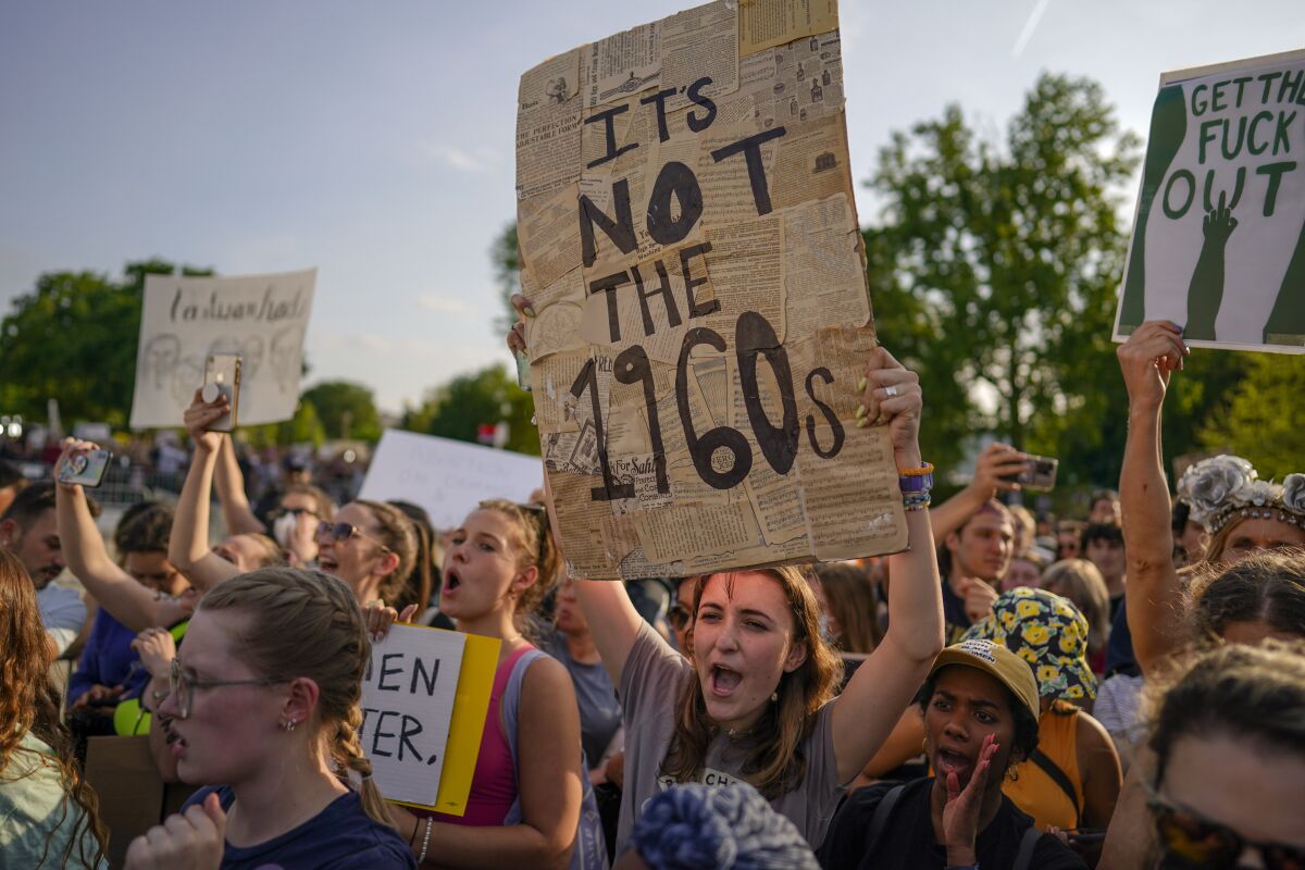 A crowd gathers outside the Supreme Court after a leaked draft indicated that Roe vs. Wade will be overturned.