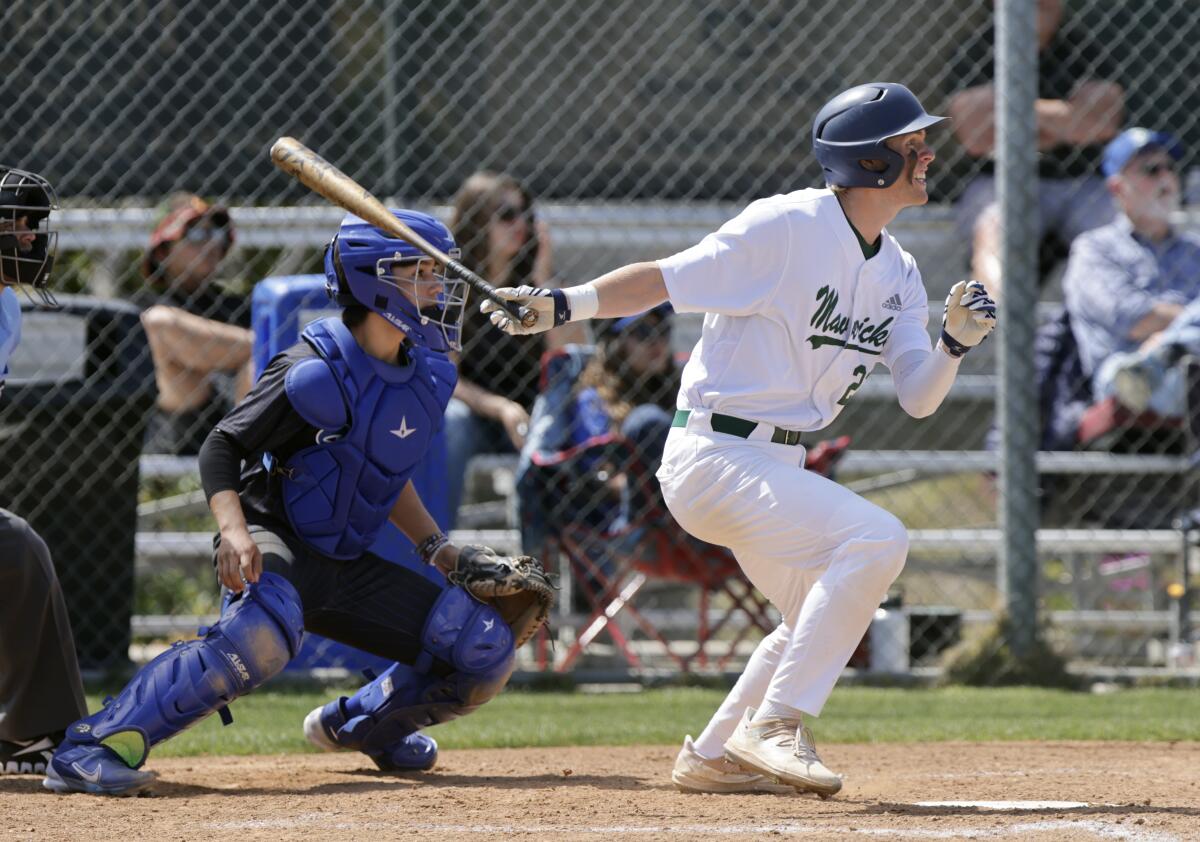 La Costa Canyon's Caden Pearlman hits an RBI single in the third inning of Thursday's win over Eastlake.