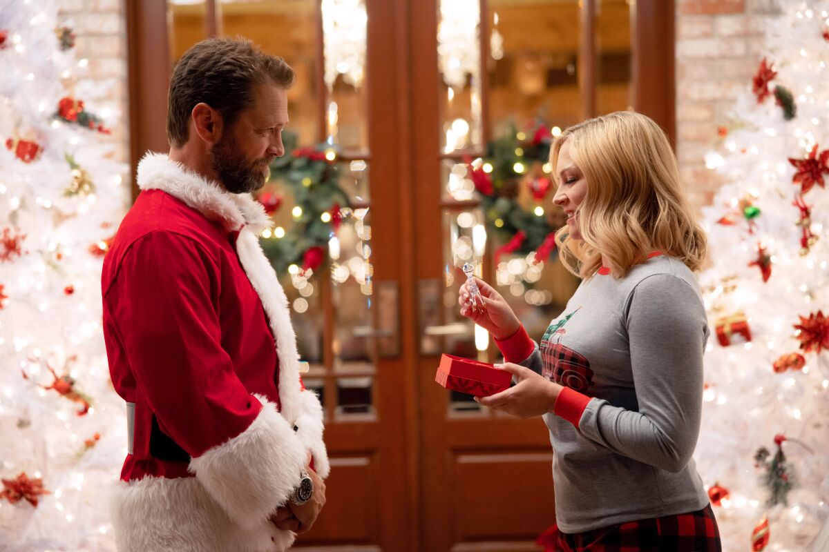 Jason Priestley and Melissa Joan Hart in "Dear Christmas"