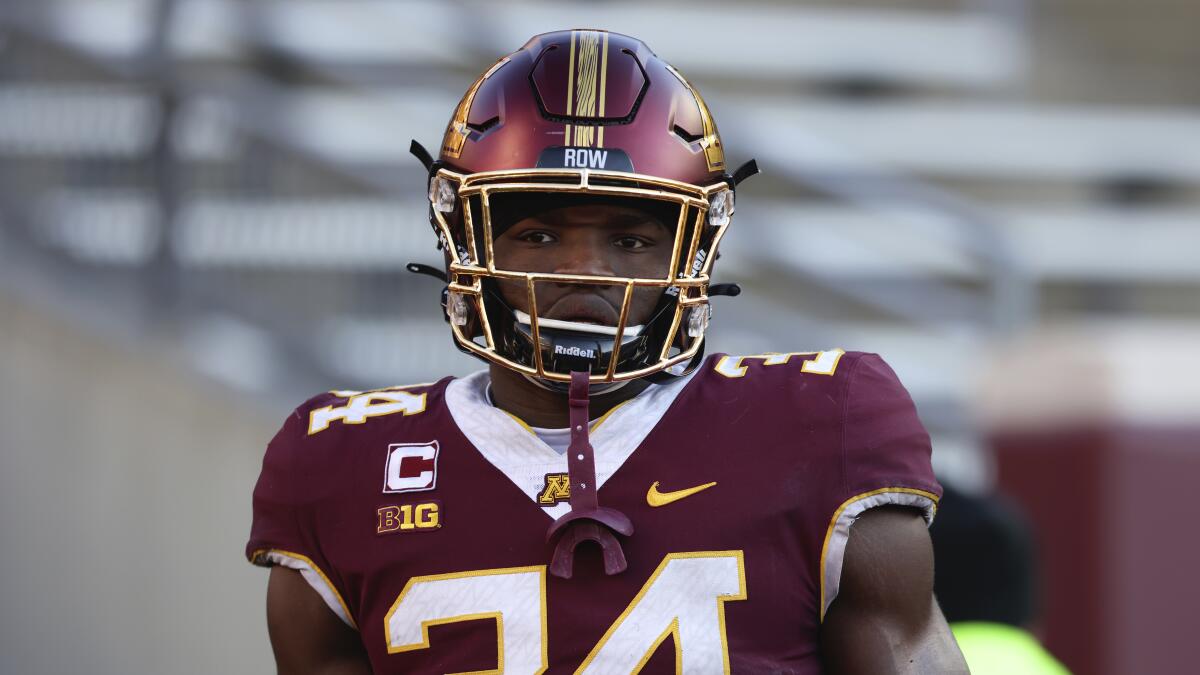 Minnesota defensive lineman Boye Mafe stands on the field before a November game against Wisconsin.