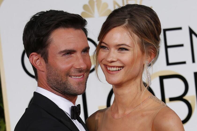 Adam Levine and Behati Prinsloo at the Golden Globes in January 2015.