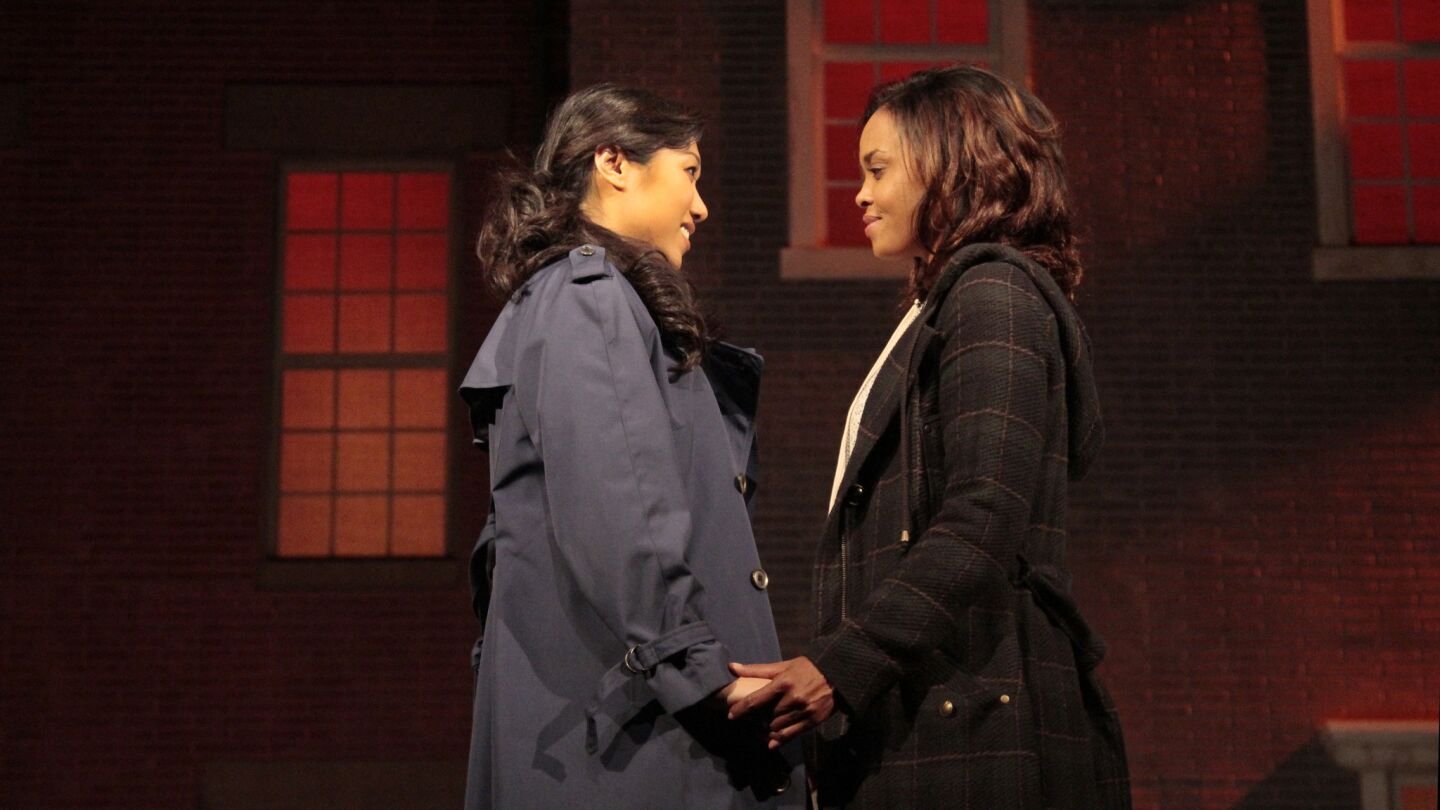 Angela Lin as Callie, left, and Sharon Leal as Sara in Diana Son's play "Stop Kiss" at Pasadena Playhouse.