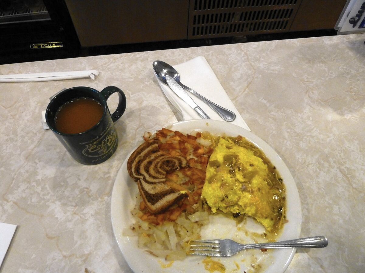 The Coffee Cup breakfast dish made famous by the Food Network, the pork chili verde omelet. It's worth the hype, and then some, a Times staff writer and frequent customer says.