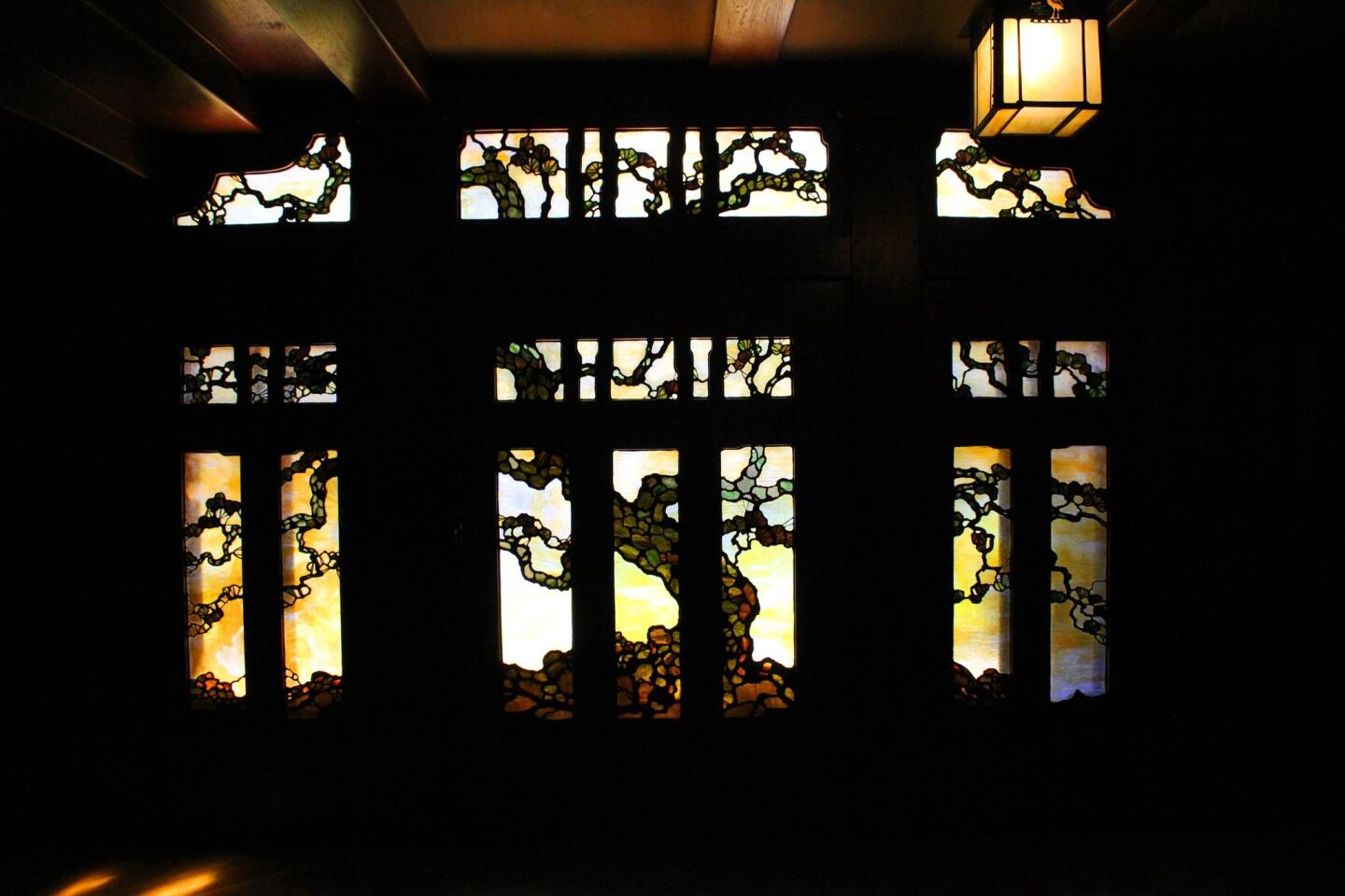 Machine Project's installations at the Gamble House are subtle and finding them can be almost like a treasure hunt. The result: the viewer spends more time noticing architects Greene & Greene's incredible design details, such as the warm glow of the Tree of Life triptych picture window.