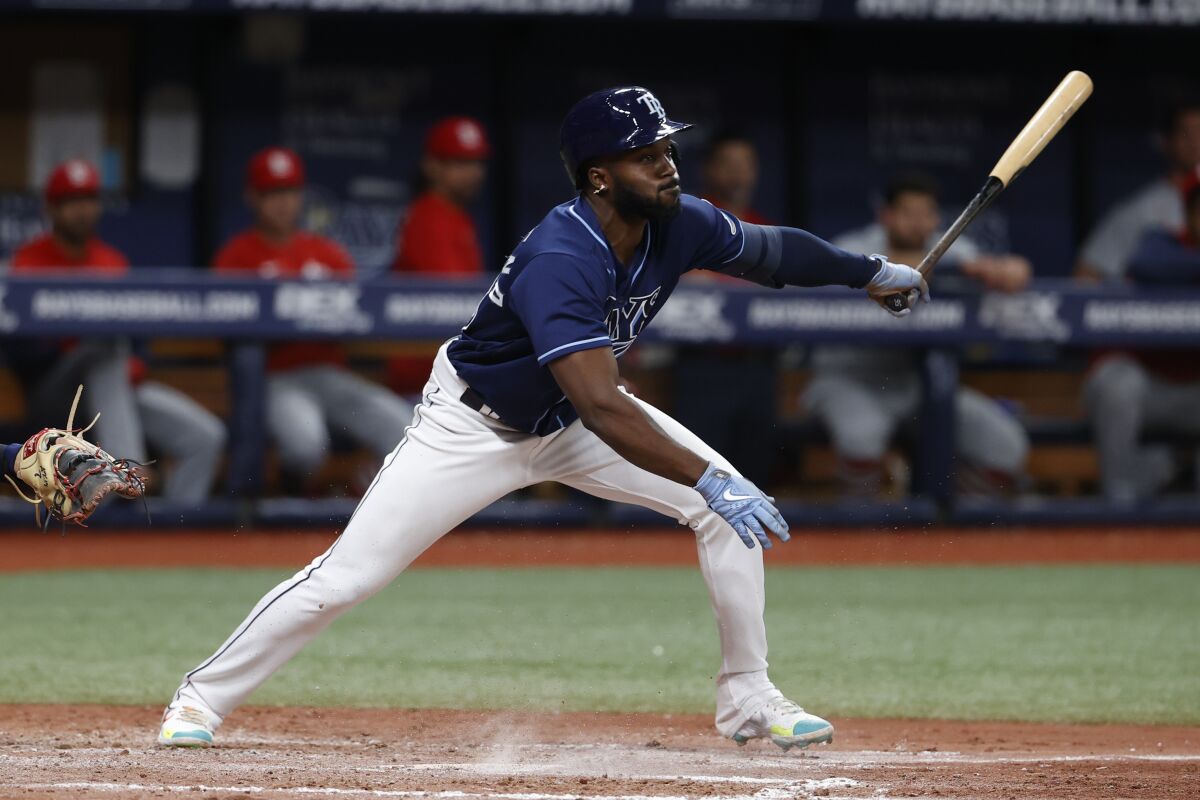 Tampa Bay Rays' Randy Arozarena drives in a run against the St. Louis Cardinals with a groundout during the sixth inning of a baseball game Wednesday, June 8, 2022, in St. Petersburg, Fla. (AP Photo/Scott Audette)