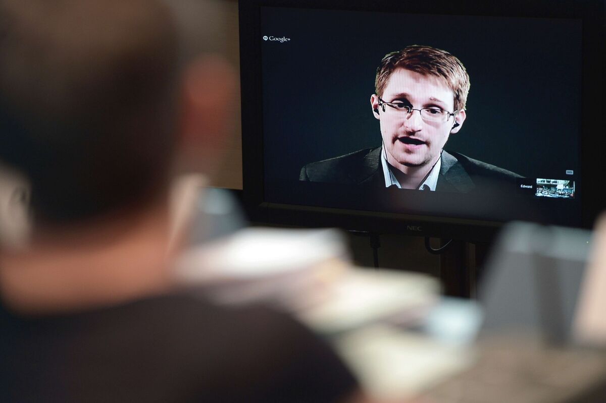 American fugitive Edward Snowden speaks to European officials in Strasbourg, France, on June 24 during a video linkup from his refuge in Russia.