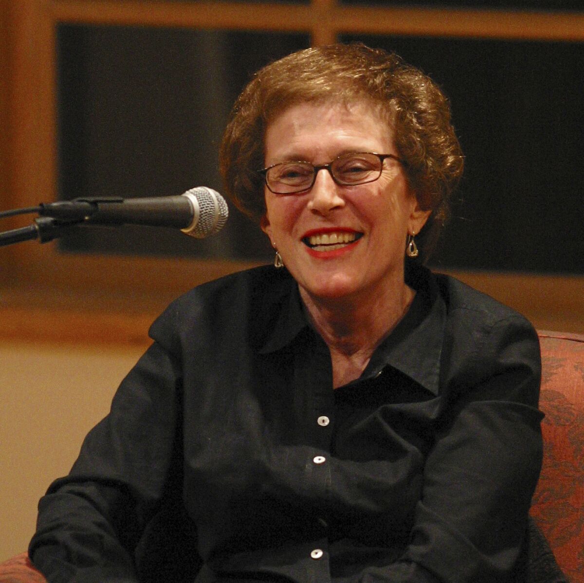 In this 2003 photo provided by Patricia Williams is Joan Micklin Silver as she is being interviewed by Kenneth Turan at the National Yiddish Book Center in Amherst, Mass. Silver, who forged a path for female directors in both independent and Hollywood films with movies including “Hester Street” and “Crossing Delancey,” has died at age 85. Silver died from vascular dementia on Thursday, Dec. 31, 2020, at her home in New York, her daughter Claudia Silver told The Associated Press. (Patricia Williams via AP)