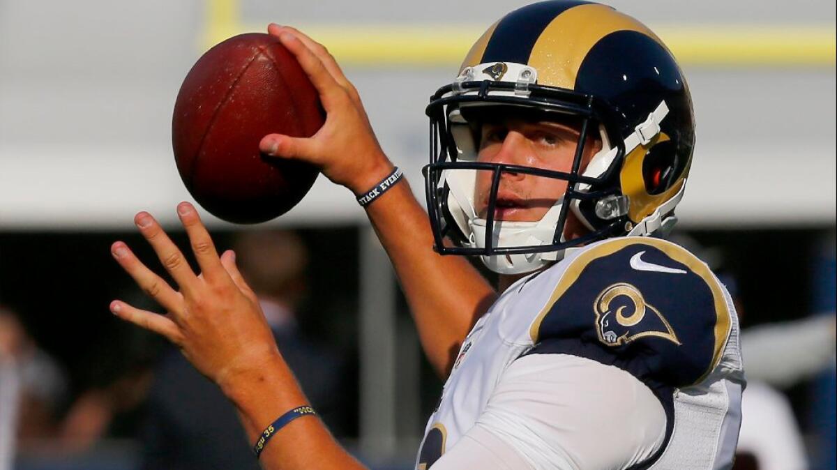 Rams quarterback Jared Goff warms up before the game against the Chiefs on Aug. 20 at the Coliseum.