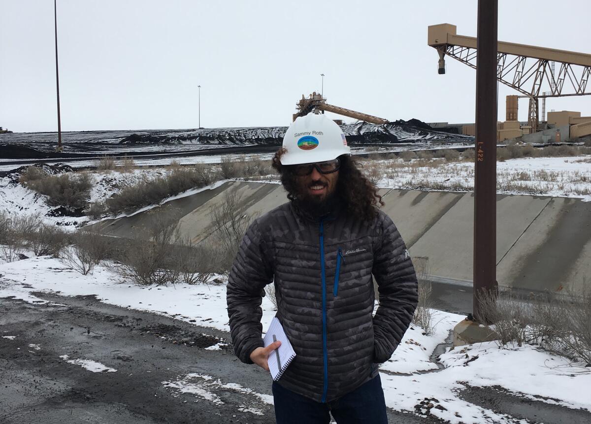 Climate columnist Sammy Roth at the L.A. Department of Water and Power's coal-fired power plant in Utah in 2019.