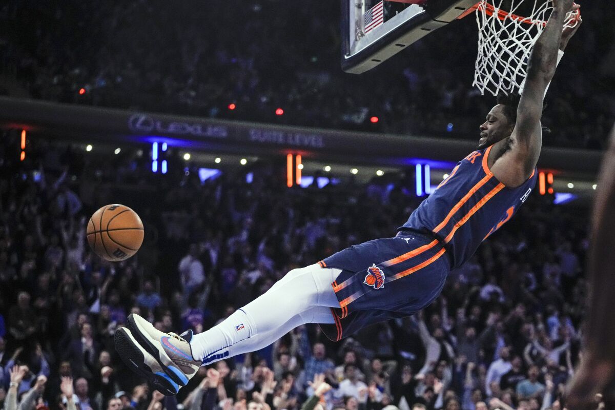 New York Knicks' Julius Randle dunks the ball during the second half of an NBA basketball game against the Miami Heat, Thursday, Feb. 2, 2023, in New York. The Knicks won 106-104. (AP Photo/Frank Franklin II)