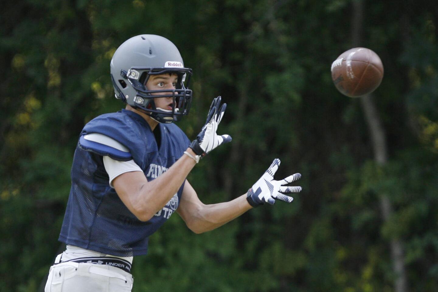 Flintridge Prep's Thomas Turchan catches the ball during practice at Flintridge Prep in La Canada on Friday, August 17, 2012.