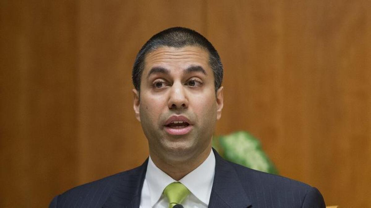 Federal Communications Commission Chairman Ajit Pai, shown at a 2015 commission meeting, recently withdrew a proposed new rule on pay-TV set-top boxes that his predecessor had circulated.