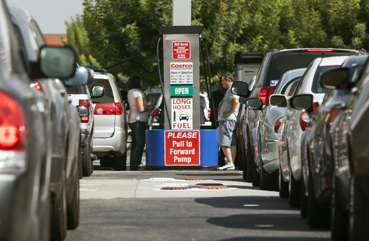 Costco members fill up with discounted gasoline at a Costco gas station in Van Nuys last year.