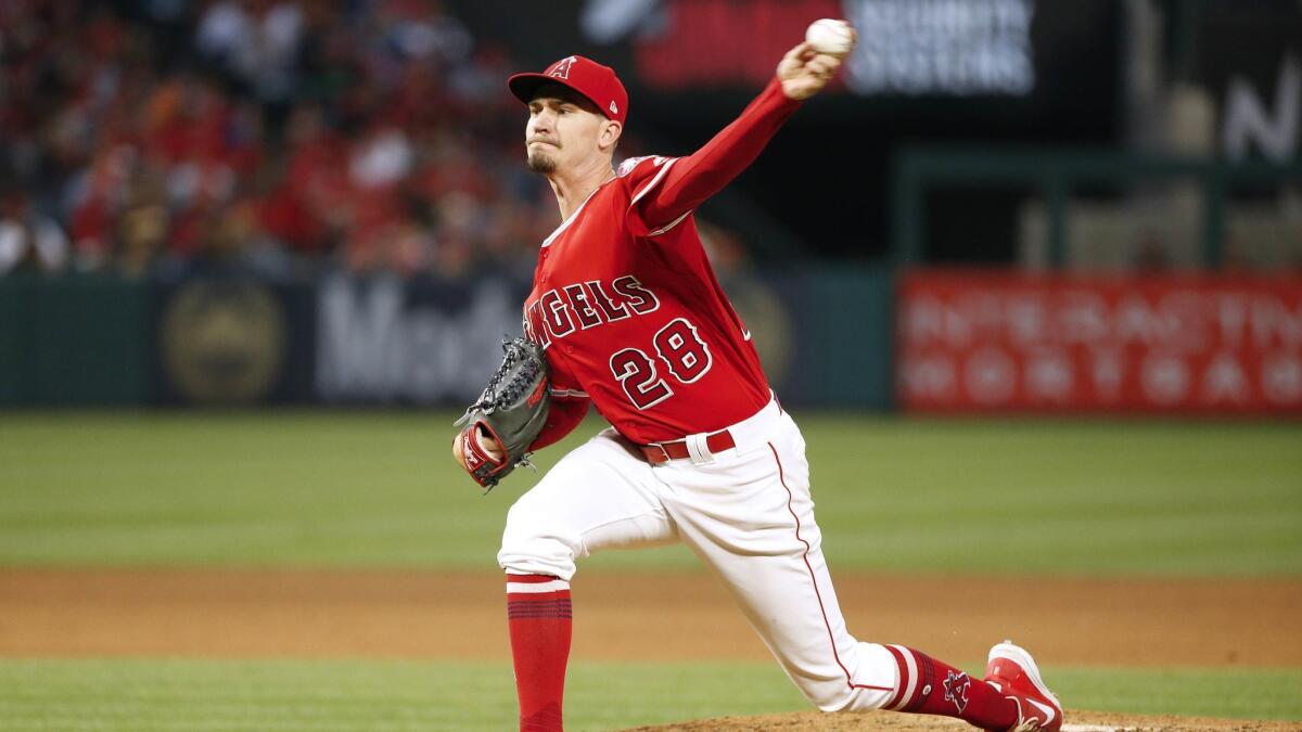 Angels starting pitcher Andrew Heaney delivers during a game against the Tampa Bay Rays in May.