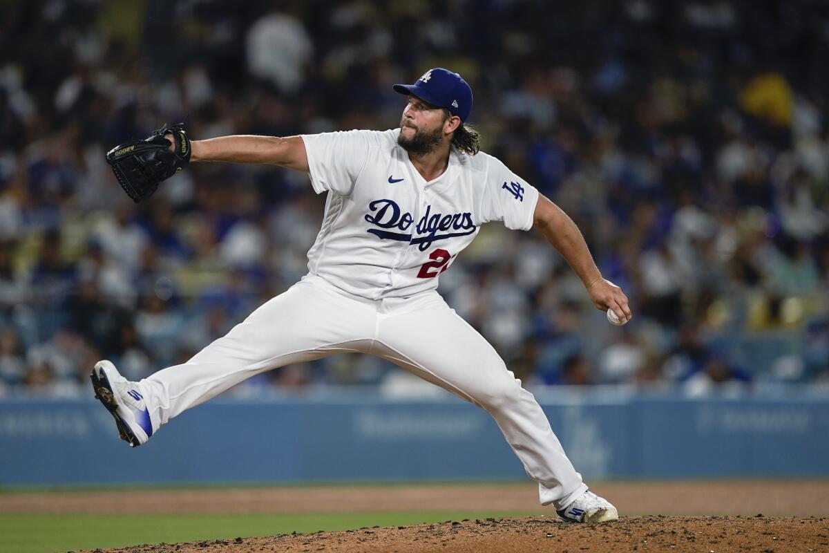 Dodgers pitcher Clayton Kershaw works against the Arizona Diamondbacks on Aug. 29, 2023, in Los Angeles.