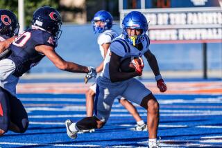 Trent Mosley of Santa Margarita makes catch during scrimmage Thursday against Chaminade.