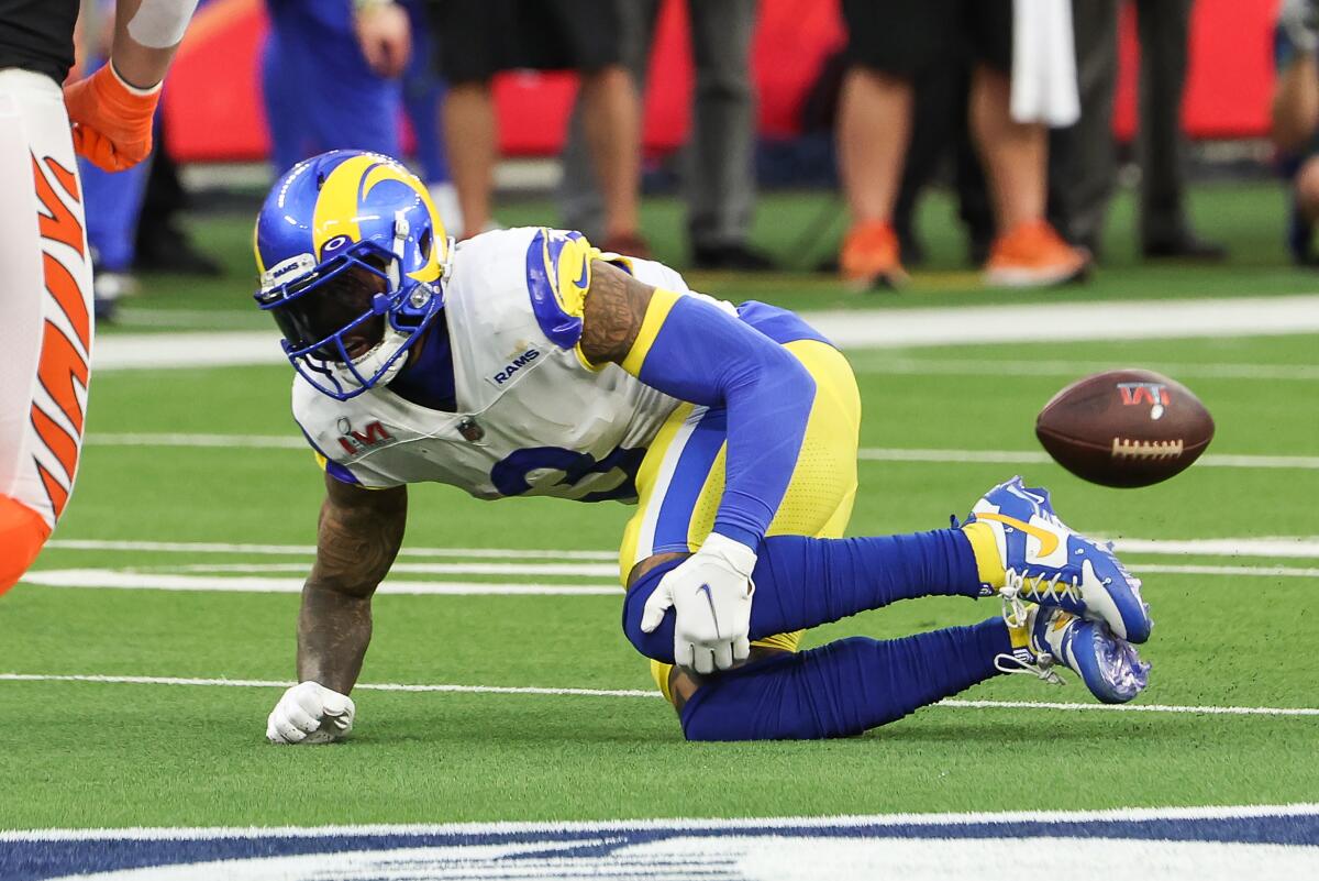 Rams wide receiver Odell Beckham Jr. grabs his injured knee during Super Bowl LVI.