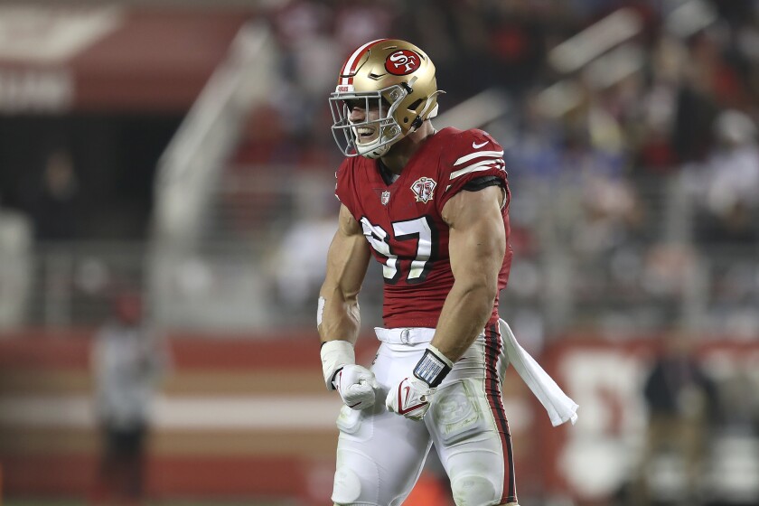 San Francisco 49ers defensive end Nick Bosa (97) reacts after sacking Los Angeles Rams quarterback Matthew Stafford during the second half of an NFL football game in Santa Clara, Calif., Monday, Nov. 15, 2021. (AP Photo/Jed Jacobsohn)