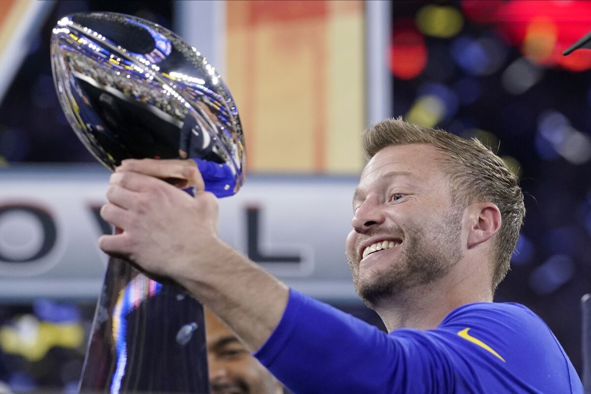 Los Angeles Rams head coach Sean McVay holds the Lombardi Trophy after the Rams defeated the Cincinnati Bengals in the NFL Super Bowl 56 football game Sunday, Feb. 13, 2022, in Inglewood, Calif. (AP Photo/Mark J. Terrill)