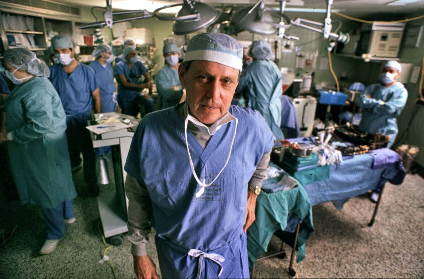 Transplant pioneer Dr. Thomas E. Starzl oversees a liver transplant operation at the University of Pittsburgh Medical Center in Pittsburgh on Nov. 10, 1989.
