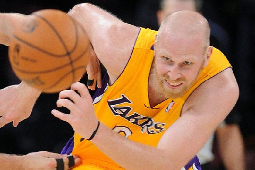 Lakers center Chris Kaman chases after a loose ball during a game against the New Orleans Pelicans last month.