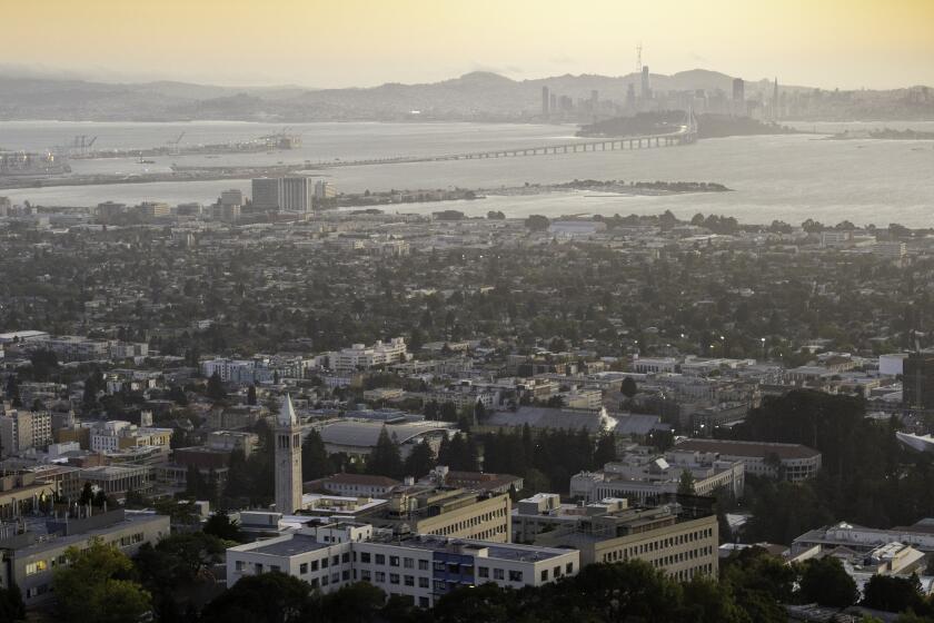 BERKELEY, CA - SEPTEMBER 09, 2019 - The UC Berkeley campus (below) is seen against the backdrop of San Francisco (above) from Berkeley, California on Sept. 09, 2019. (Josh Edelson/For the Times)