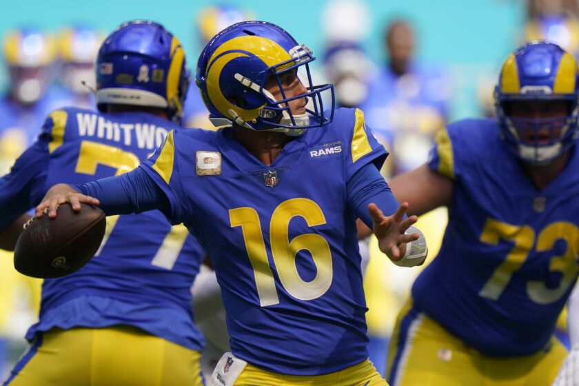Los Angeles Rams quarterback Jared Goff (16) looks to pass during the first half of an NFL football game.